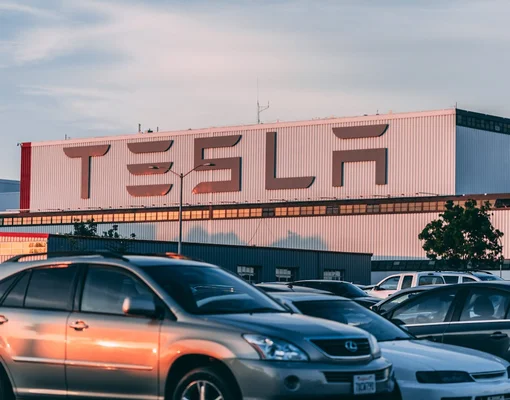 Petrol and Diesel cars in front of Tesla Factory